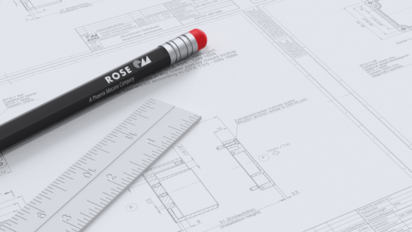 Rose Systemtechnik - Konstruktionszeichnung für Sondergehäuse mit Lineal und Bleistift